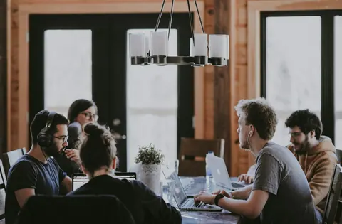 Team collaborating around a table