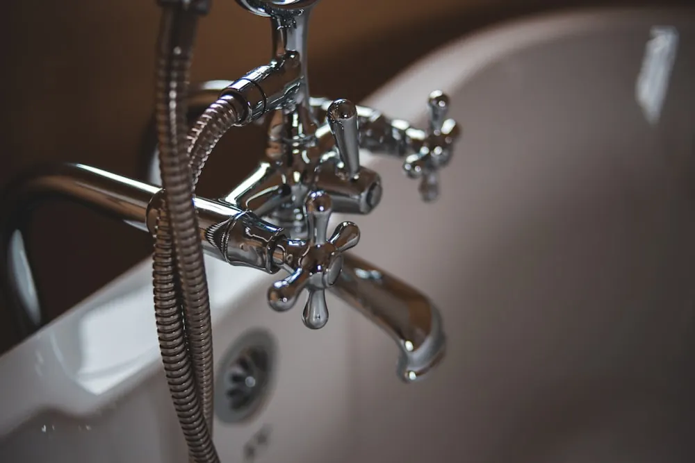 Chrome faucet close-up — plumbing service