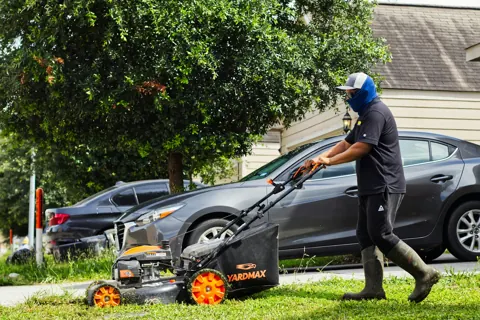 Mowing a residential lawn